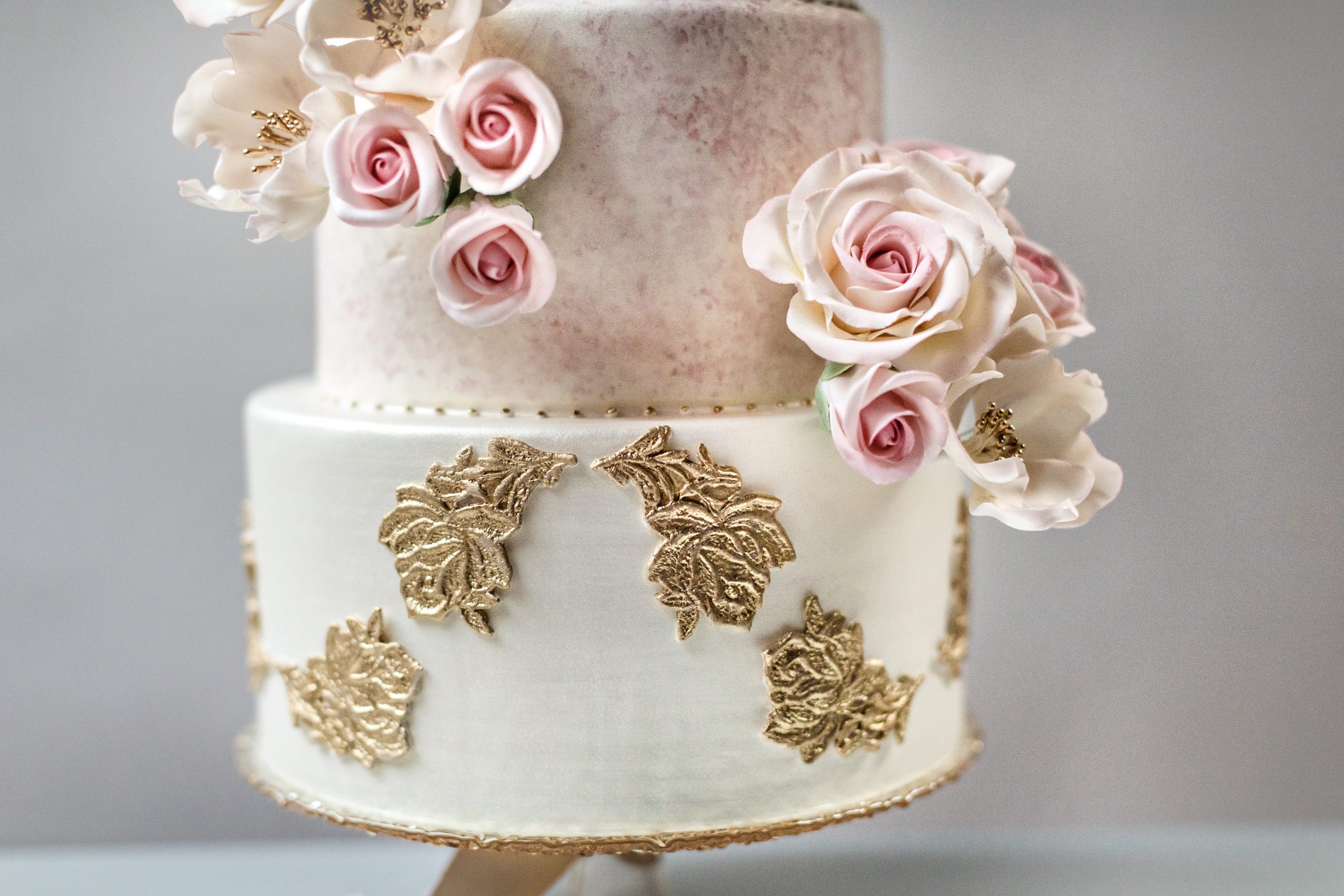 Stunning vintage, romantic, pink & gold custom wedding cake detail with sugar flowers. Luxury designer wedding cakes by Ana Parzych